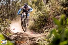 Local Aussie rider Josh Carlson using his knowledge of Thredbo to roll him into first place during the All-Mountain descent.